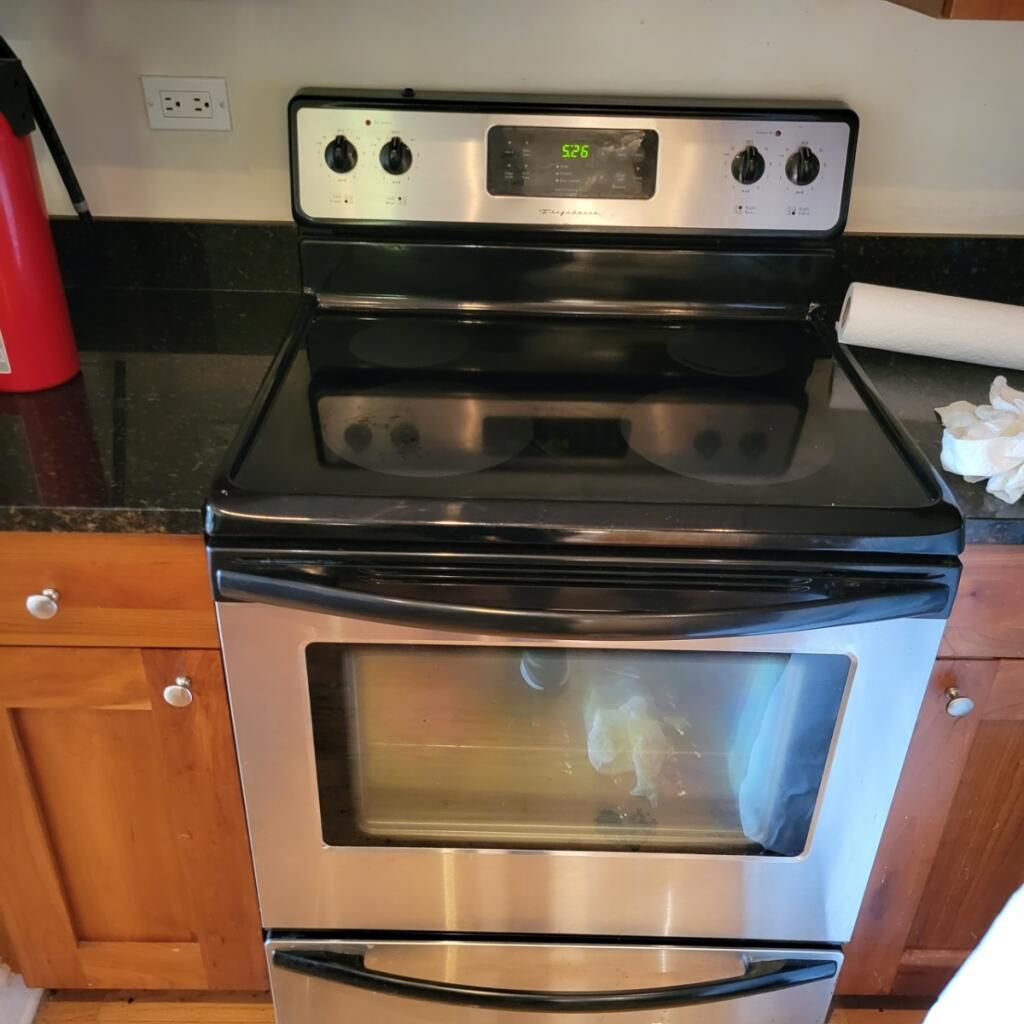 Polished stainless steel stove after cleaning